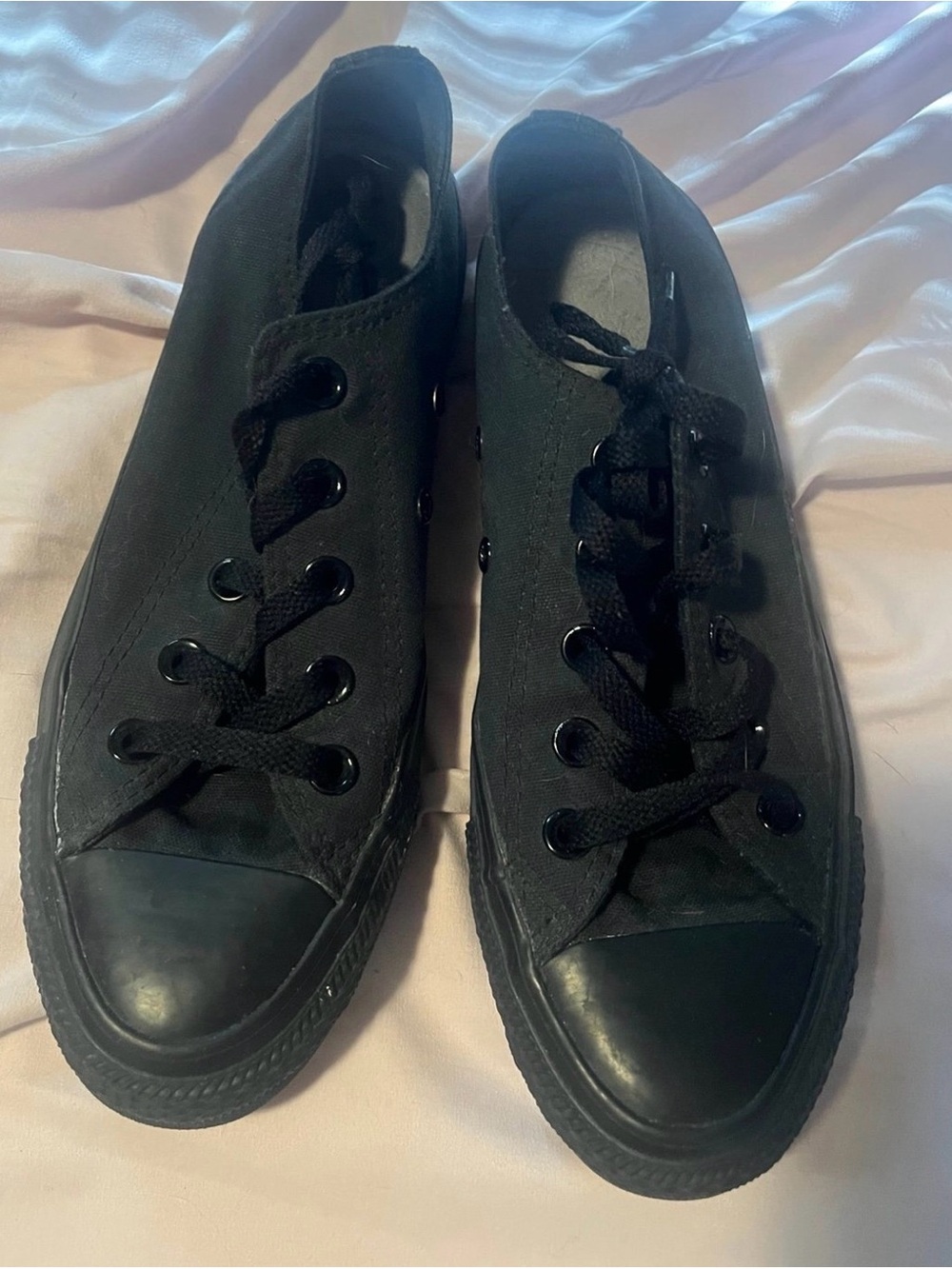 Women’s black low top converse